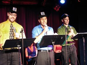 Brian Cimmet, David Perlman and James Donegan sing "We JEL," about government checks and balances, in The 7-Year B*tch.